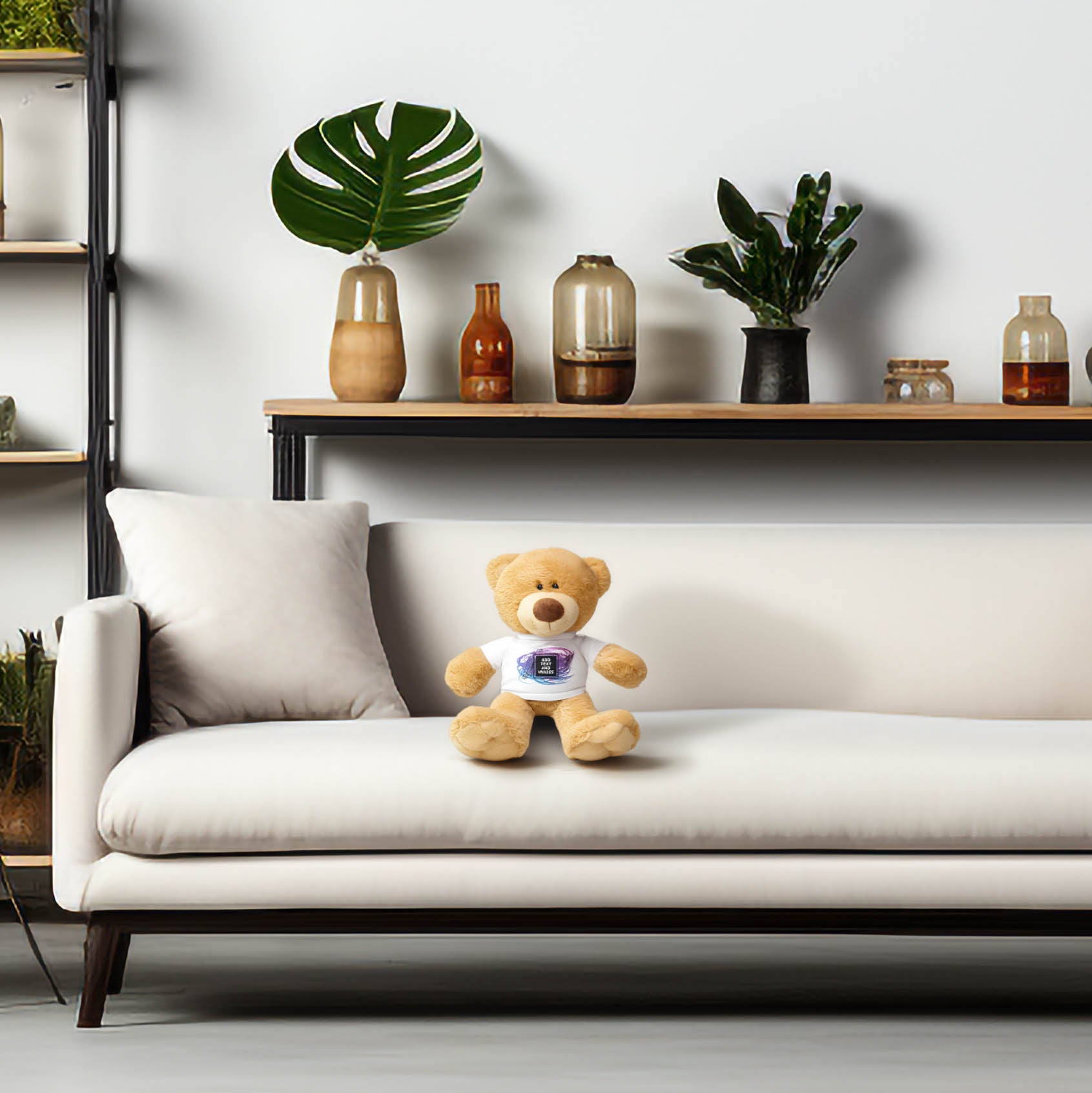 Customizable teddy bear on a white couch with a shelf of plants and jars in the background