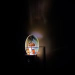 Night light with a beach scene design on a dark background