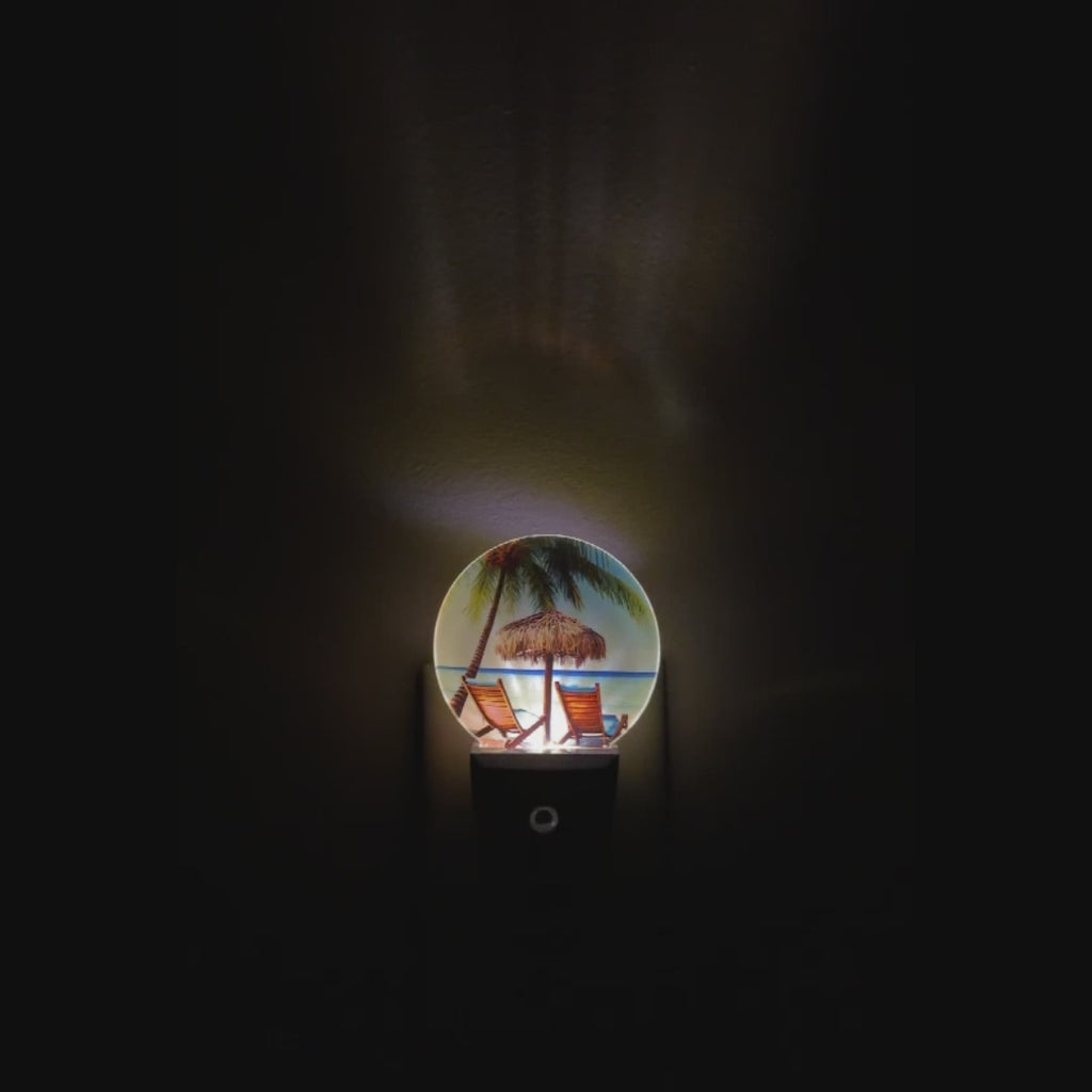 A video demonstrating the visual effect of this LED photo night light that shows a beautiful beach, ocean view and beach chairs.